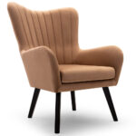 Elegant Scandinavian wingback armchair Tedi in a living room setting