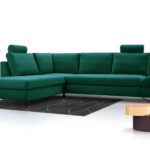 Lofi II corner sofa with black metal legs and adjustable armrests in a modern living room.