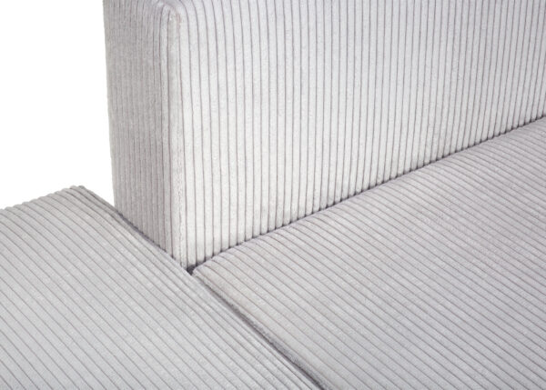 Scandi sofa showcasing its spacious bedding storage compartment, functional design