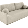 Close-up of Anabell sofa bed's soft boucle fabric and decorative cushion.