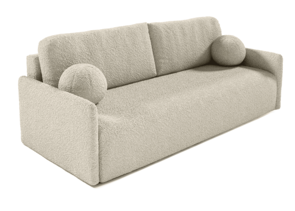 Close-up of Anabell sofa bed's soft boucle fabric and decorative cushion.