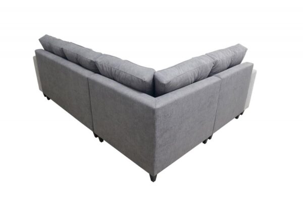Detailed view of the ADONIS VI Corner Sofa's quilted backrest and plush cushions.
