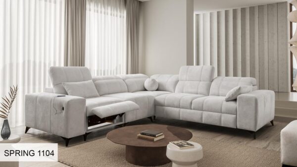 Close-up of DAFNE III sofa's integrated USB port and sleek control buttons