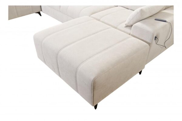 DAFNE X corner sofa showing spacious bedding storage underneath seat.