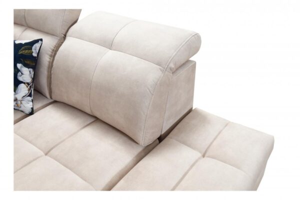 Side profile of GOLDEN IX sofa, showing sleek design and armrest