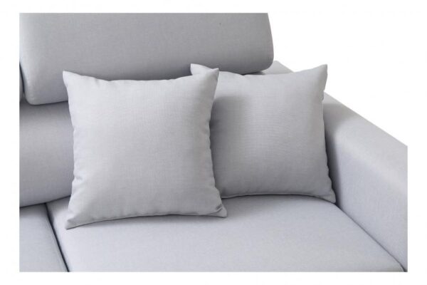 Detail of LORETTO III Corner Sofa's integrated storage compartment.