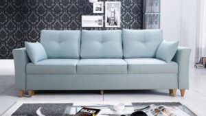 TORSTEN modern sofa bed in grey fabric, front view.