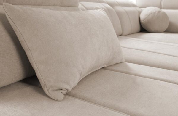 RAVELLO VI sofa showing one of its integrated storage compartments, ideal for bedding.