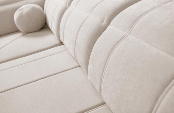 RAVELLO VI corner sofa in a wide shot, presenting its overall grandeur and adjustable features.