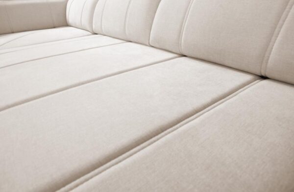 RAVELLO VI sofa showcasing its 'Puma' automatic sleeping mechanism in action.