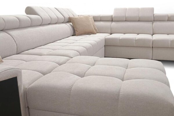 Elegant GRECO XIII corner sofa with a close-up of the stylish decorative pillows