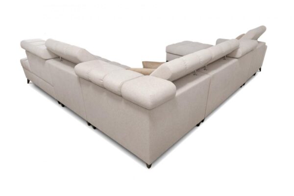 Detailed view of GRECO XIII sofa's spacious bedding storage compartment