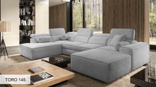 VITO VI corner sofa with a person relaxing, illustrating comfort and spaciousness