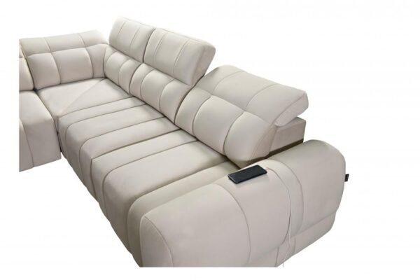 Right-hand facing AVELIO III corner sofa in a studio.