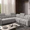 AVELIO III corner sofa positioned against a modern wall.