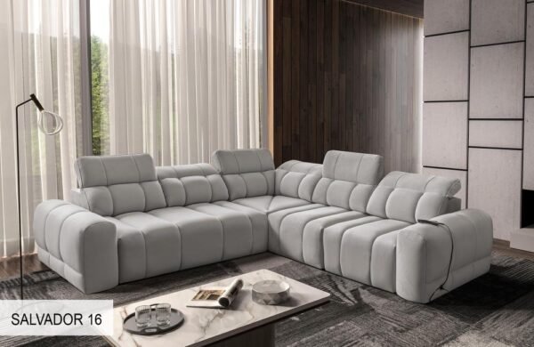 AVELIO III corner sofa positioned against a modern wall.