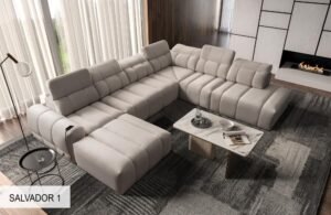 AVELIO X modern corner sofa in a light grey fabric living room.