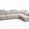Close-up of AVELIO XI corner sofa's adjustable headrest and fabric texture